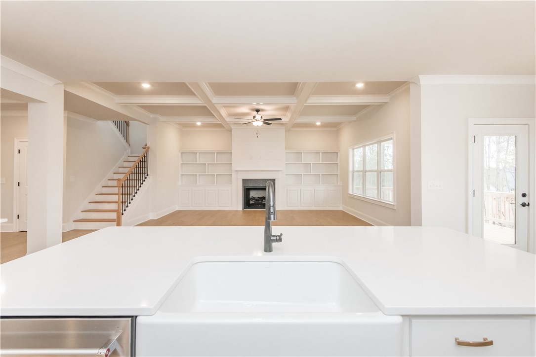 222 Holly Br Road Piedmont, SC 29673 - Photo 15 of 31 This bright and airy kitchen offers a seamless flow into the living space, perfect for entertaining.