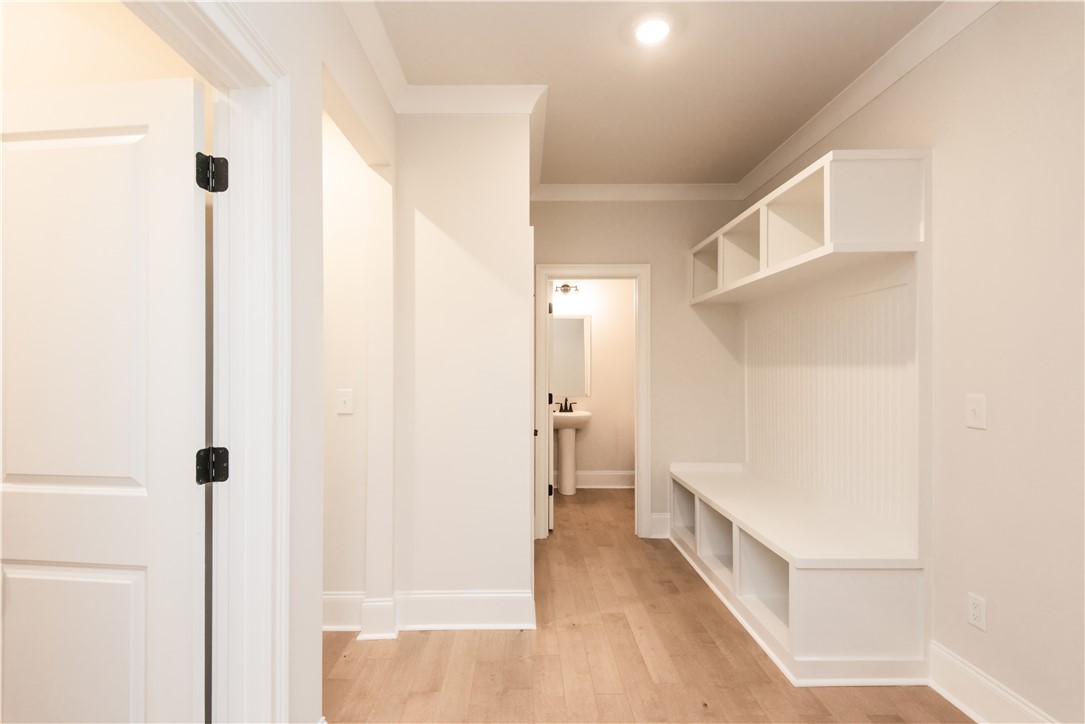 222 Holly Br Road Piedmont, SC 29673 - Photo 17 of 31 This bright hallway features beautiful flooring and functional built-in storage solutions.