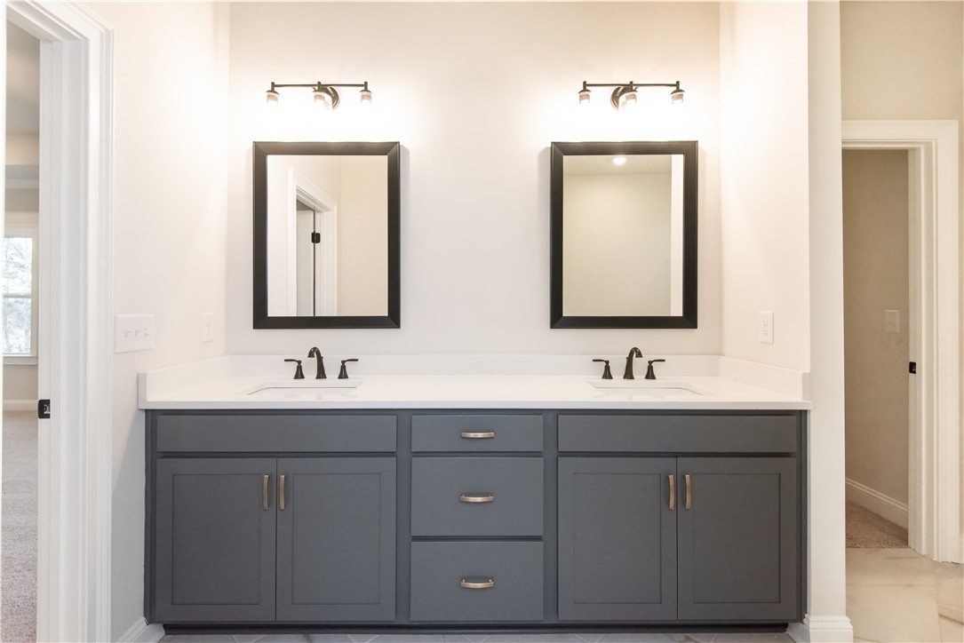 222 Holly Br Road Piedmont, SC 29673 - Photo 23 of 31 This spacious bathroom features a double vanity, offering ample counter space and storage.