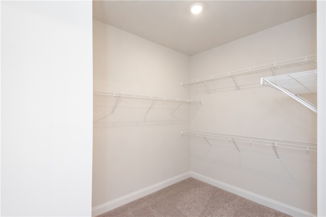 222 Holly Br Road Piedmont, SC 29673 - Photo 25 of 31 This spacious walk-in closet offers ample storage with convenient wire shelving.