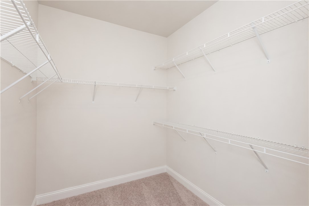 222 Holly Br Road Piedmont, SC 29673 - Photo 26 of 31 This ample walk-in closet offers extensive storage solutions with convenient wire shelving.