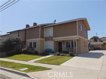 2005 Alabama Street, Unit 2 Huntington Beach, CA 92648 - Photo 1 of 1 a front view of a house with a yard