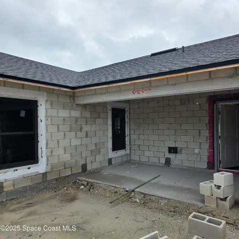 a front view of a house with parking