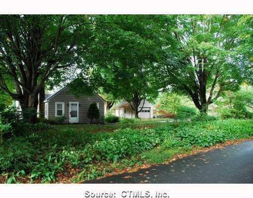 80 Church Street Old Saybrook, CT 06475 - Photo 1 of 1 a view of front of a house with a yard