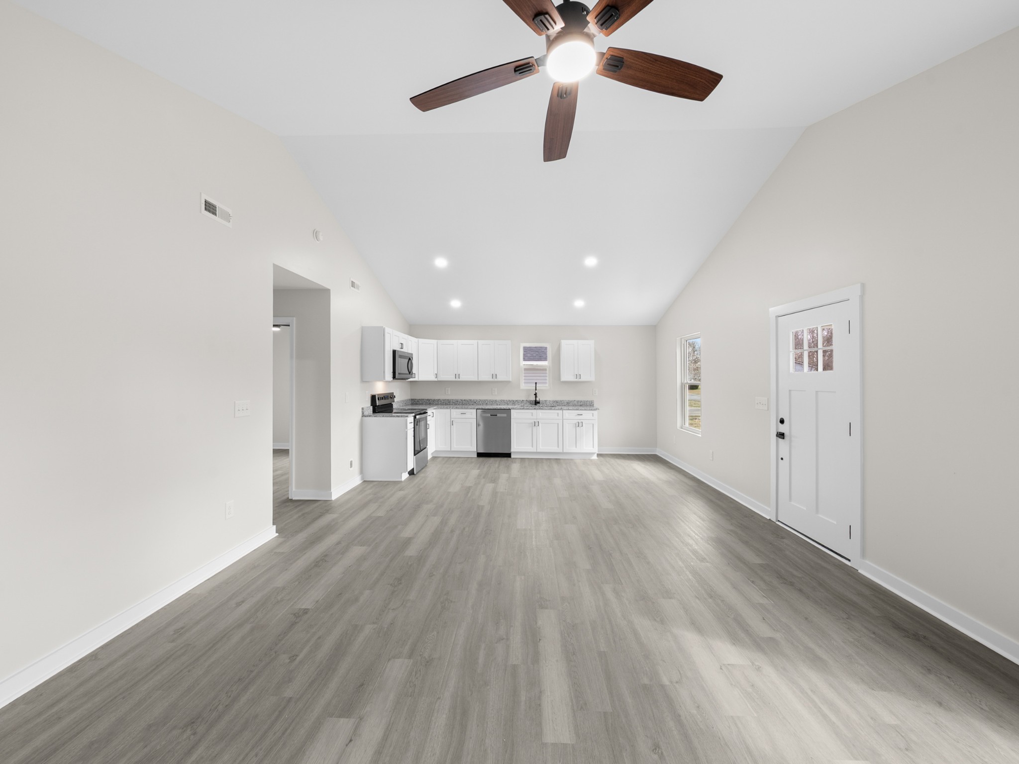 711 Hunt Street Winchester, TN 37398 - Photo 9 of 30 a view of a kitchen with a sink and microwave