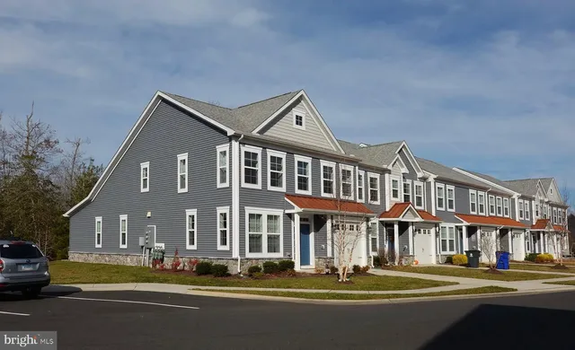 a front view of a building with street view