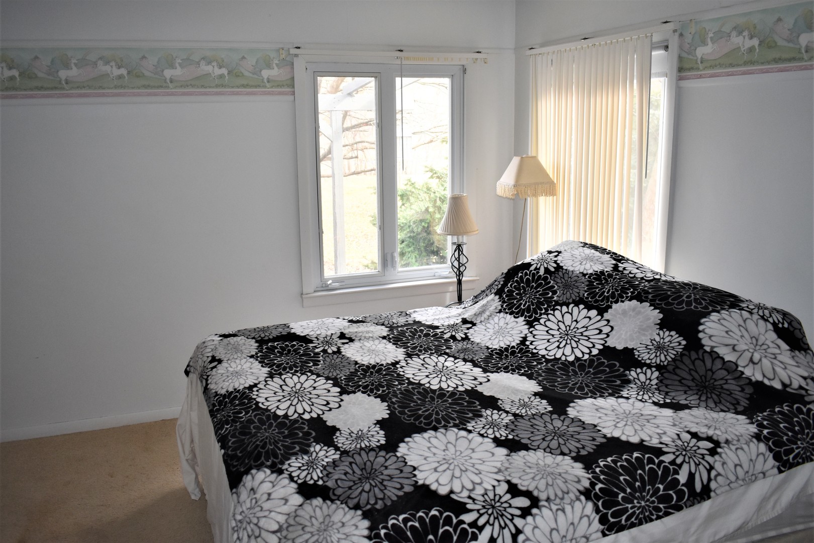 2821 A East 3500s Road Kankakee, IL 60901 - Photo 14 of 38 a bedroom with a bed and a window
