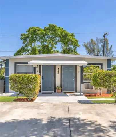 front view of a house with a outdoor space