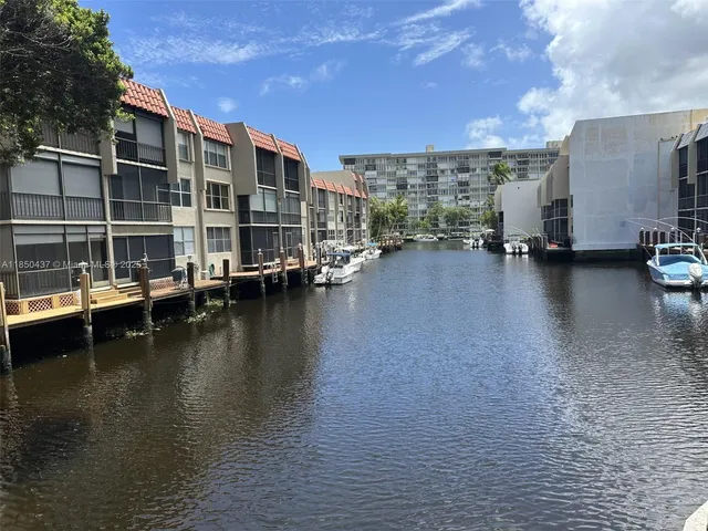 a view of a lake with houses