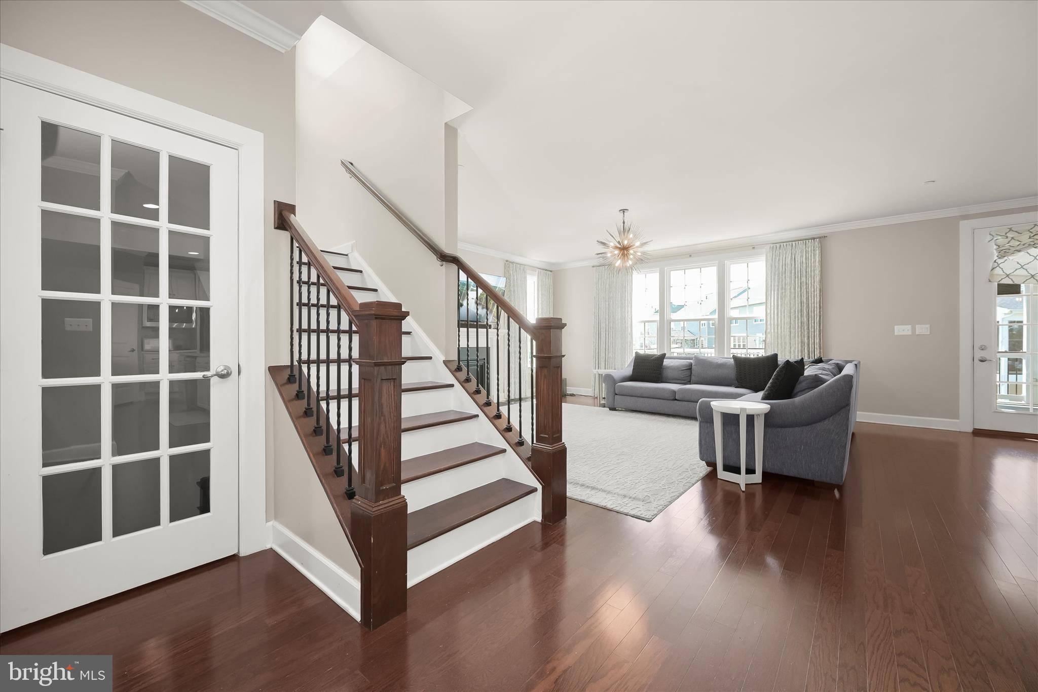 11047 Martha Way Fulton, MD 20759 - Photo 13 of 80 a view of entryway and hall with wooden floor