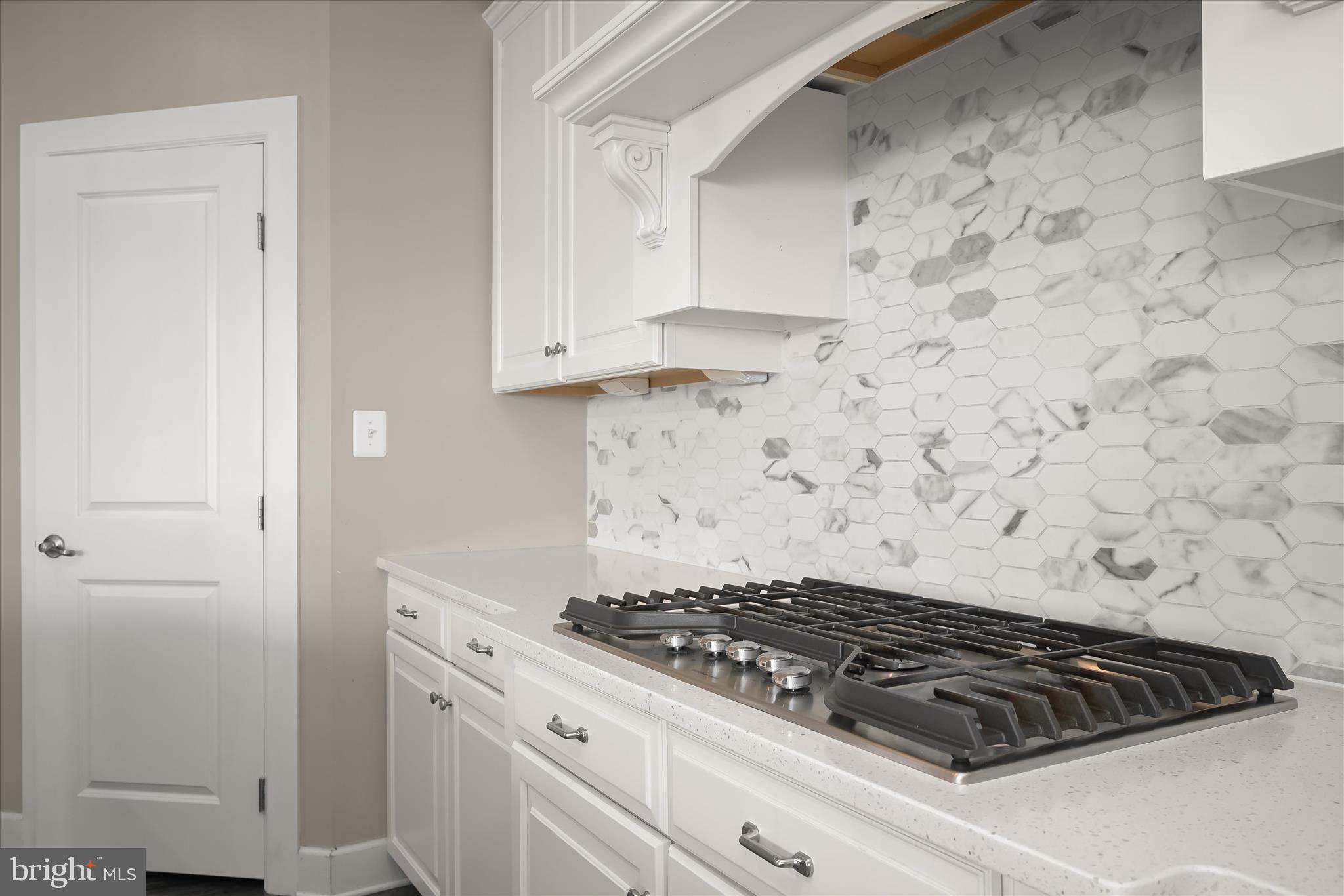 11047 Martha Way Fulton, MD 20759 - Photo 16 of 80 a stove top oven sitting inside of a kitchen