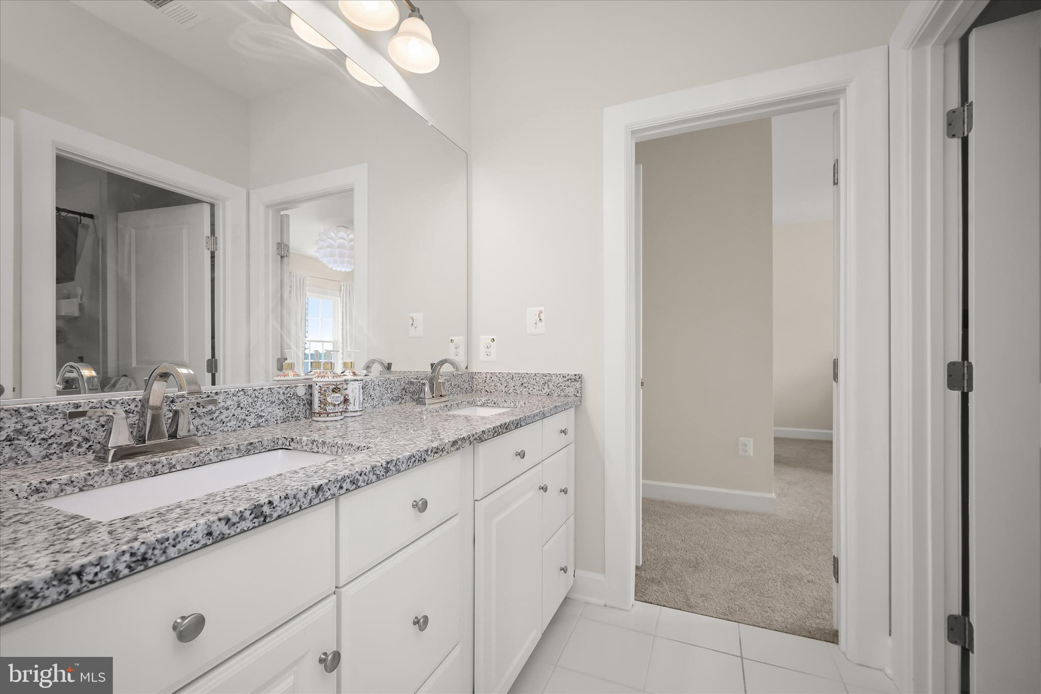 11047 Martha Way Fulton, MD 20759 - Photo 37 of 80 a bathroom with a granite countertop sink and a mirror