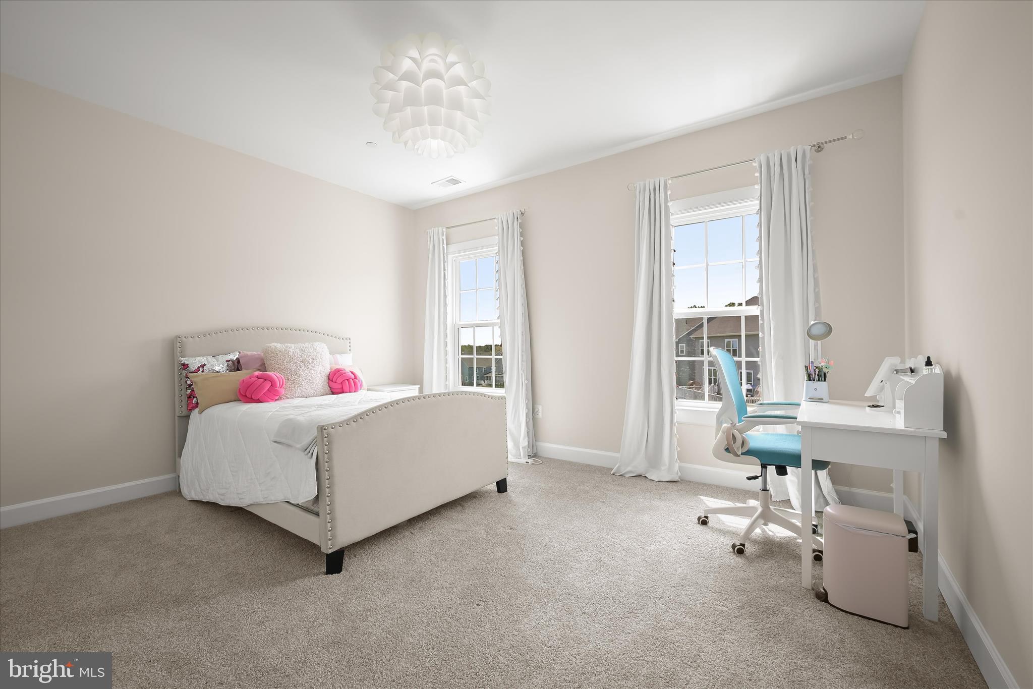 11047 Martha Way Fulton, MD 20759 - Photo 40 of 87 a living room with furniture and a table