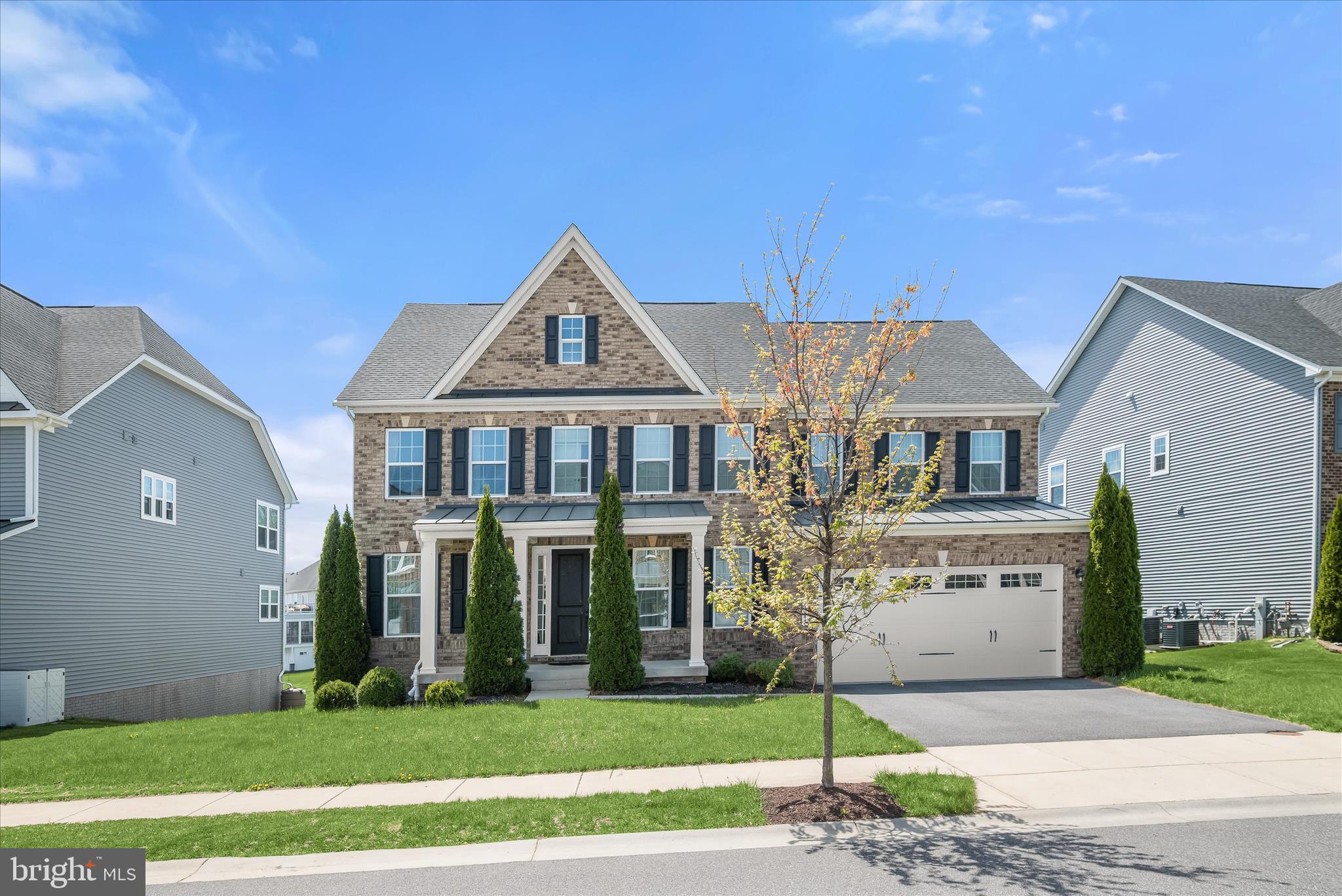 11047 Martha Way Fulton, MD 20759 - Photo 53 of 87 a front view of a house with a yard