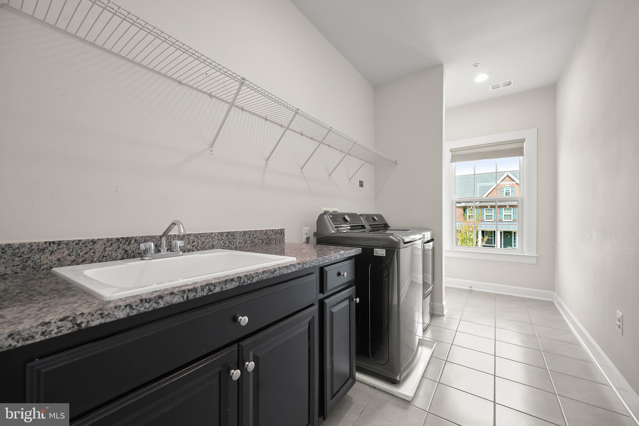 11047 Martha Way Fulton, MD 20759 - Photo 55 of 87 Upper Level Laundry Room