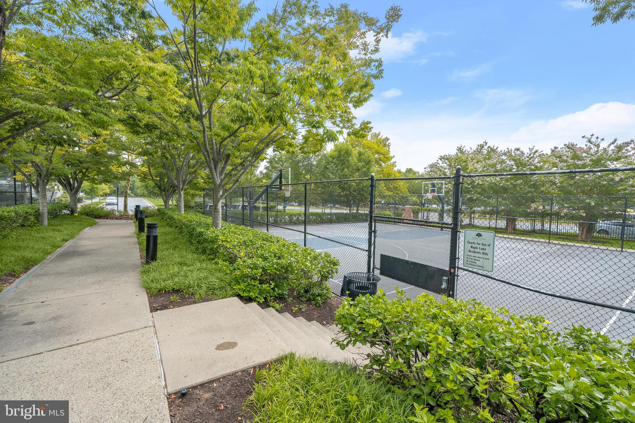 11047 Martha Way Fulton, MD 20759 - Photo 77 of 87 a view of a garden with a bench in the garden