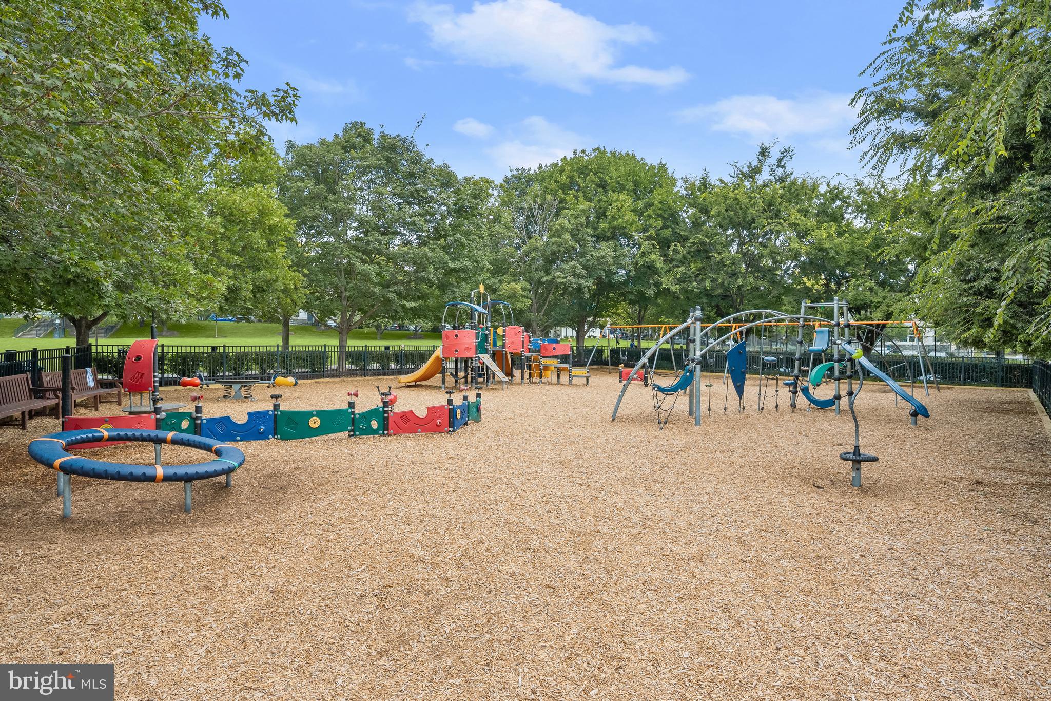 11047 Martha Way Fulton, MD 20759 - Photo 81 of 87 a view of a park with swings and slides