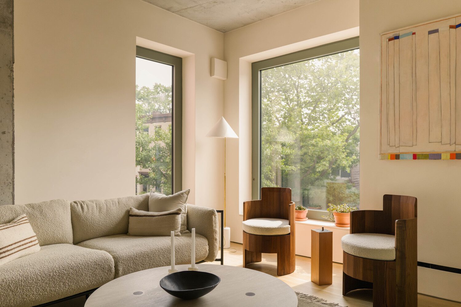 144 Vanderbilt Avenue, Unit 4A Brooklyn, NY 11205 - Photo 3 of 24 a living room with furniture and a large window