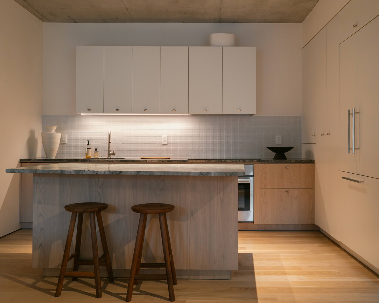 144 Vanderbilt Avenue, Unit 4A Brooklyn, NY 11205 - Photo 4 of 24 a kitchen with a sink cabinets and window