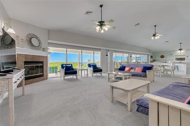 a view of a lake with a house in the background