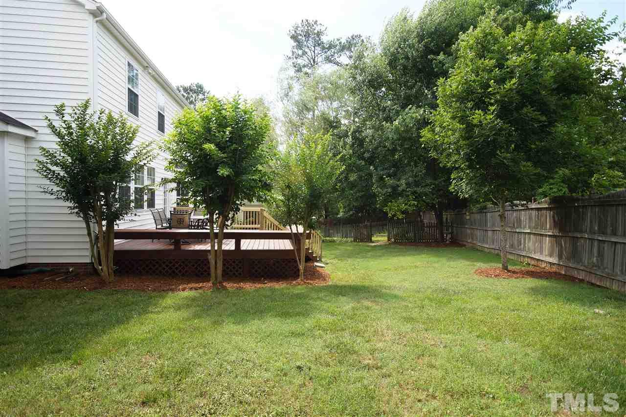 8512 Metronome Lane Raleigh, NC 27613 - Photo 2 of 4 a garden view with a seating space