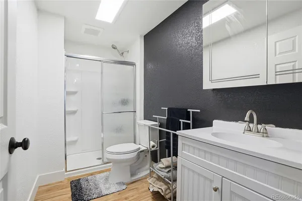 a view of a porch with furniture and a yard