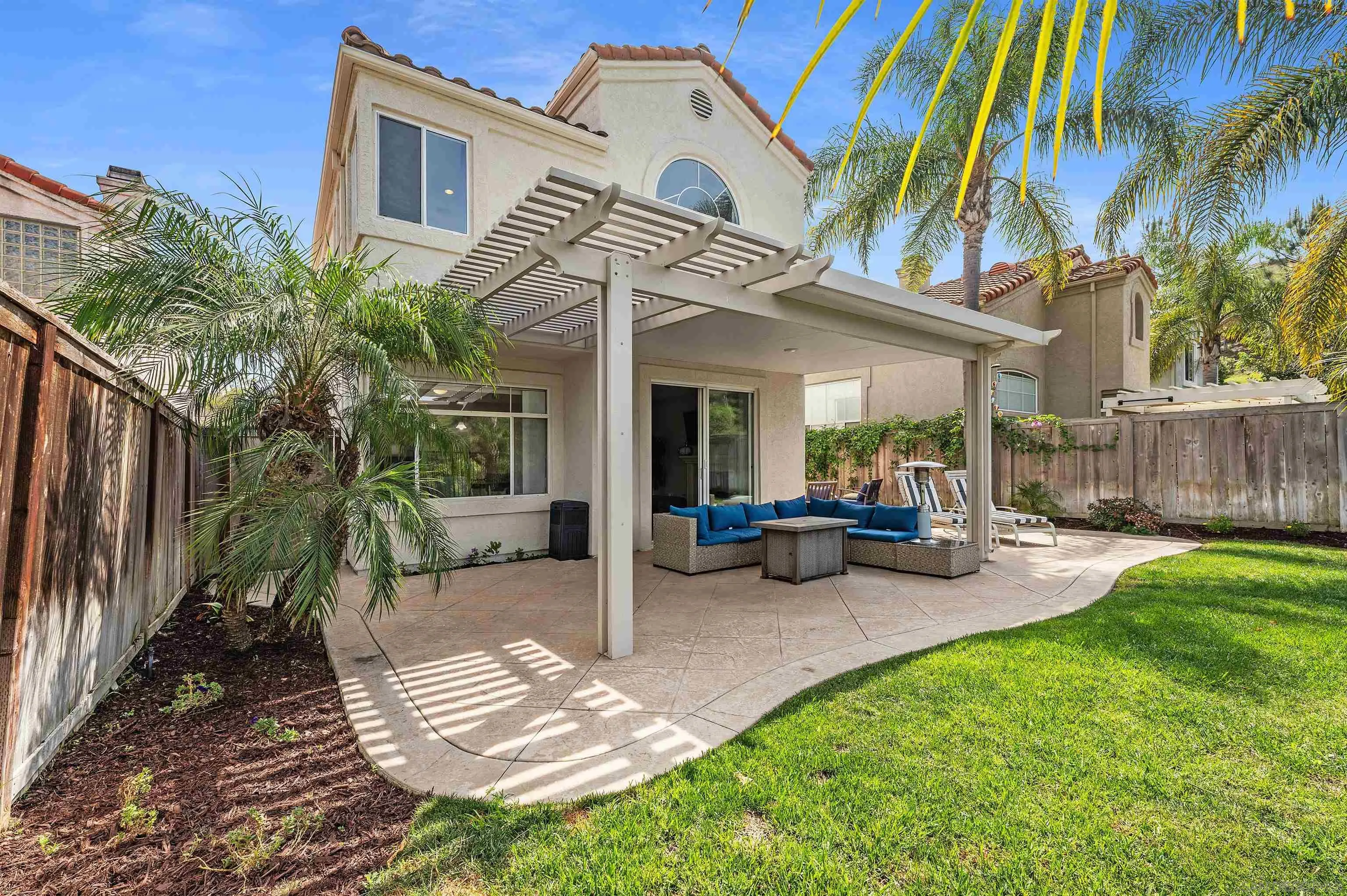1571 Corte Daniel Oceanside, CA 92056 - Photo 25 of 44 a view of a house with backyard and sitting area