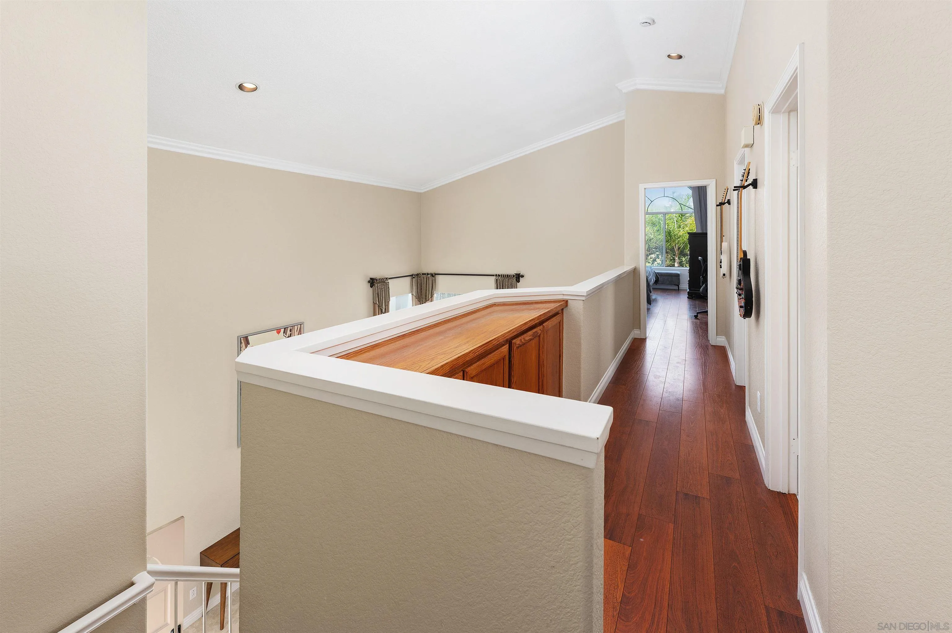 1571 Corte Daniel Oceanside, CA 92056 - Photo 31 of 44 a view of utility room with wooden floor