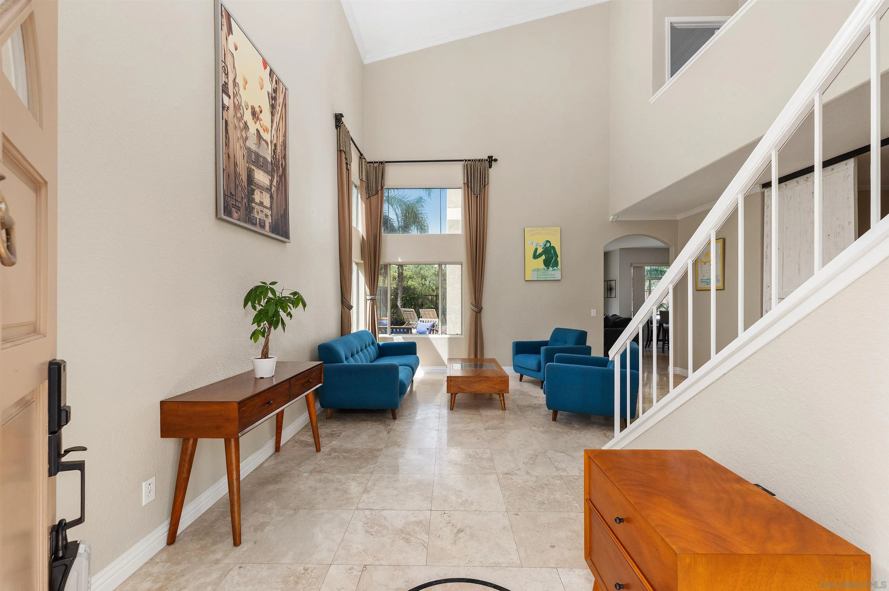 1571 Corte Daniel Oceanside, CA 92056 - Photo 7 of 44 a living room with furniture and a potted plant