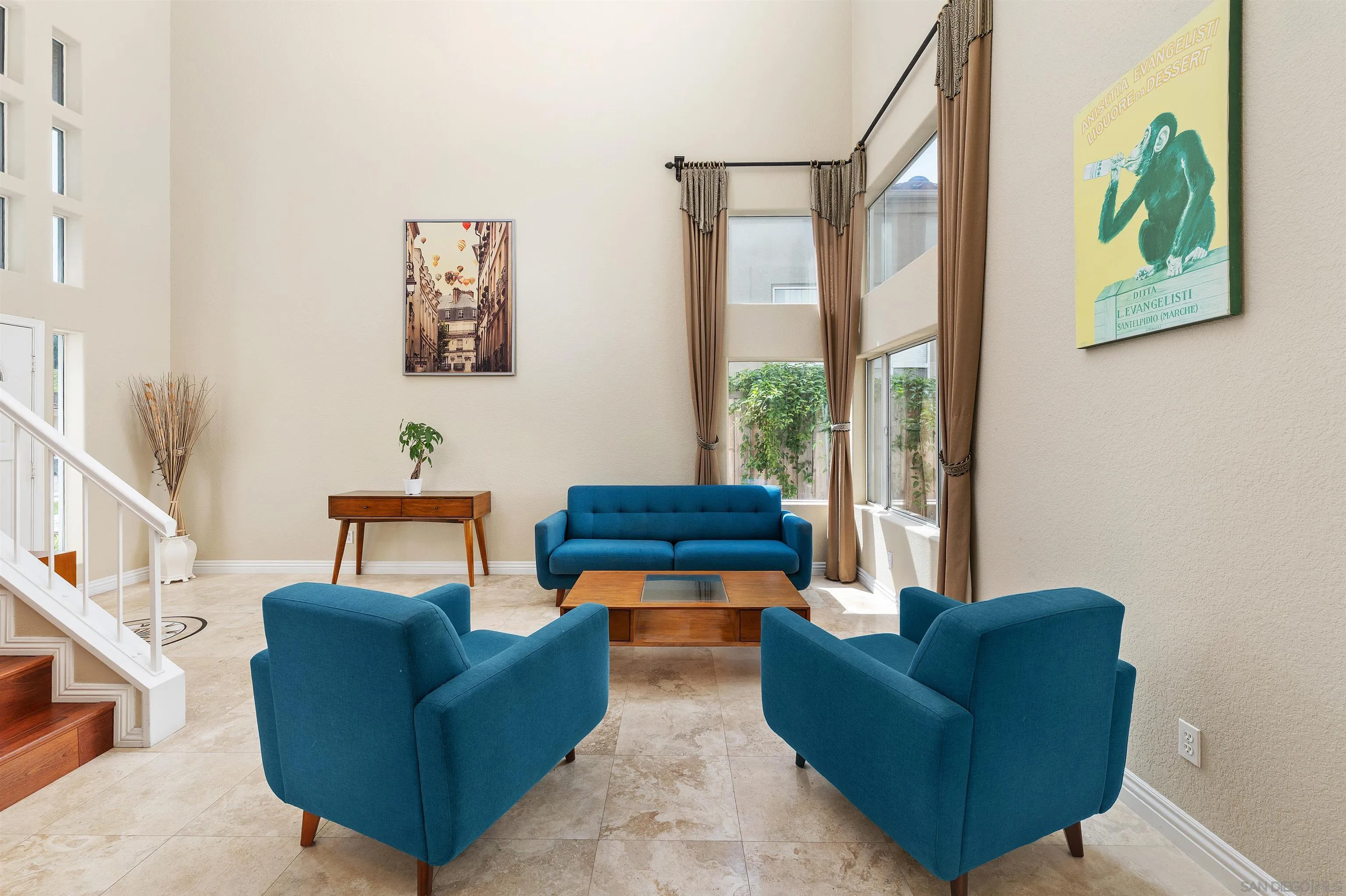 1571 Corte Daniel Oceanside, CA 92056 - Photo 9 of 44 a living room with furniture and a floor to ceiling window