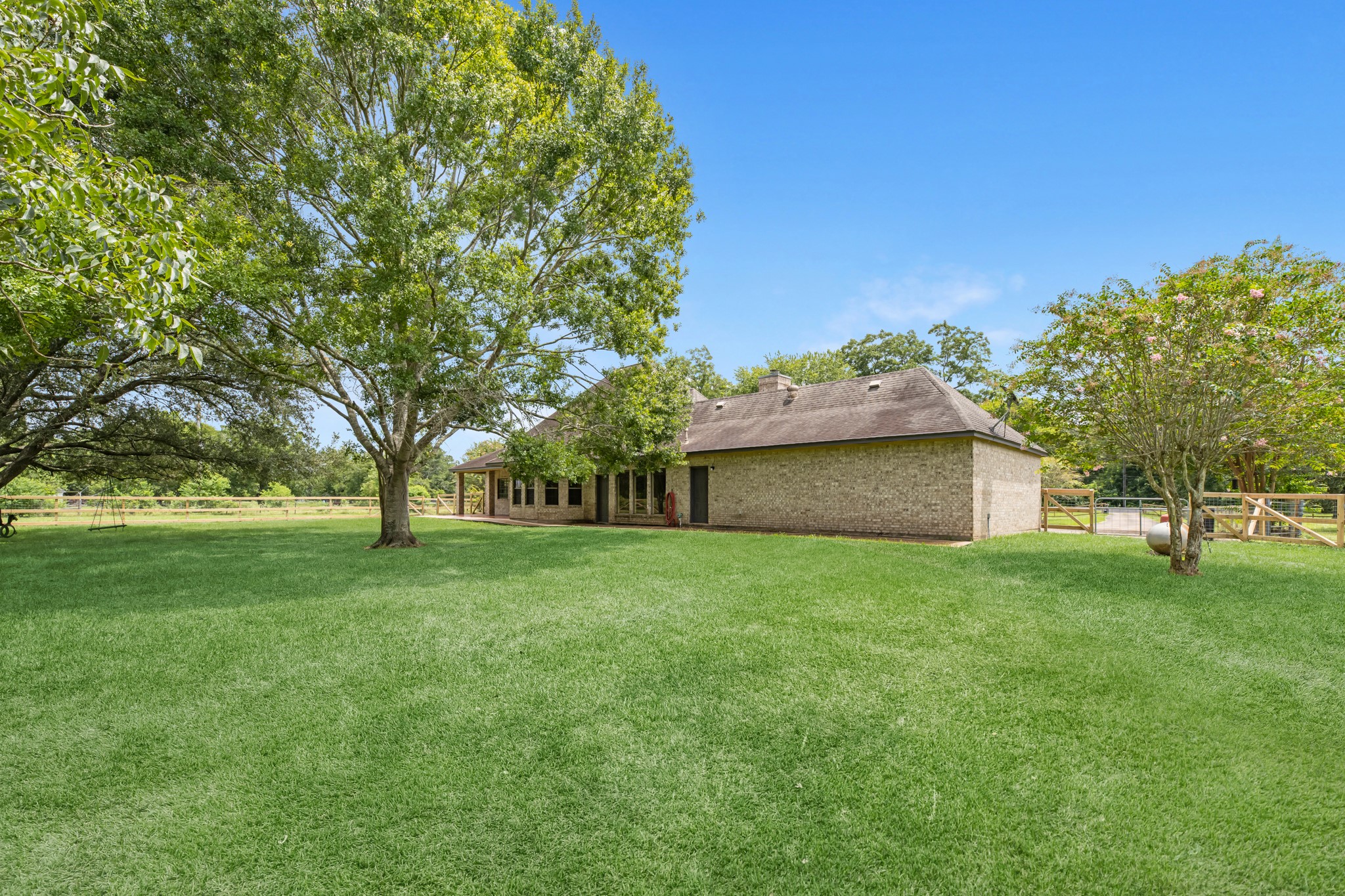 17126 County Road 39 Rosharon, TX 77583 - Photo 45 of 47 Back view of the homes features the easy maintenance brick facade.
