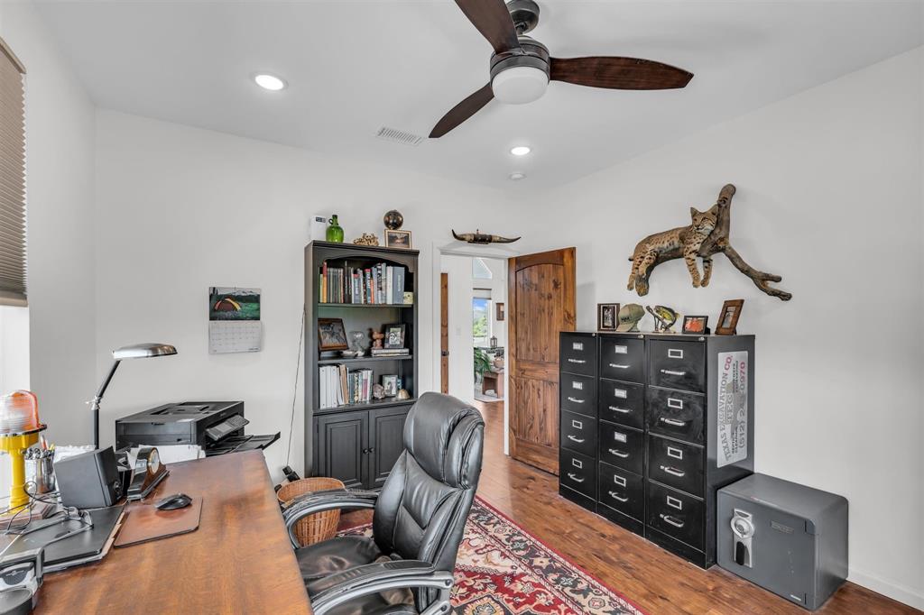 211 Knust Circle Gholson, TX 76705 - Photo 18 of 34 a view of a workspace with furniture and a ceiling fan