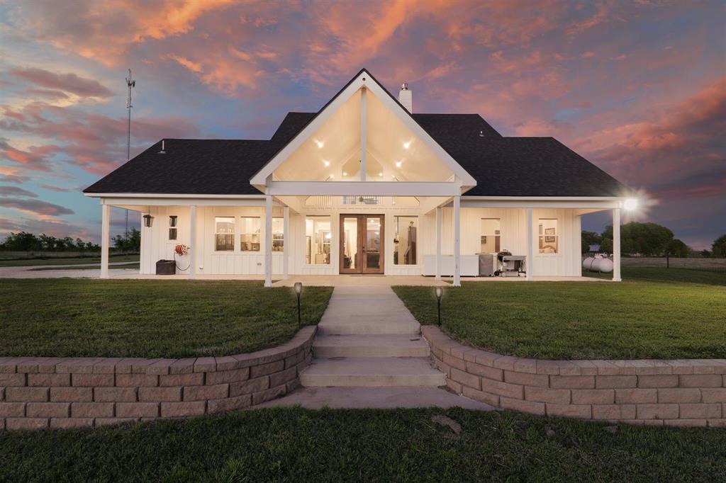 211 Knust Circle Gholson, TX 76705 - Photo 2 of 34 a front view of a house with a yard