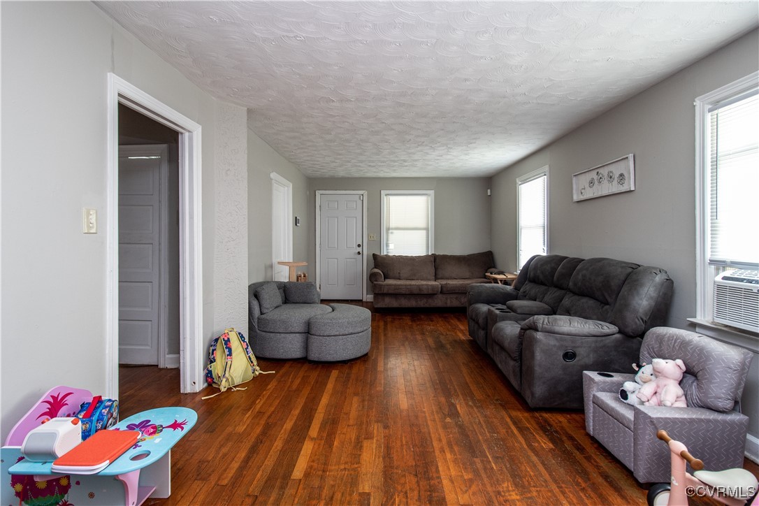 1707 Arlington Road Hopewell, VA 23860 - Photo 1 of 13 a living room with furniture and a wooden floor