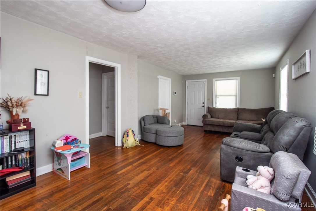 1707 Arlington Road Hopewell, VA 23860 - Photo 2 of 13 a living room with furniture and a wooden floor