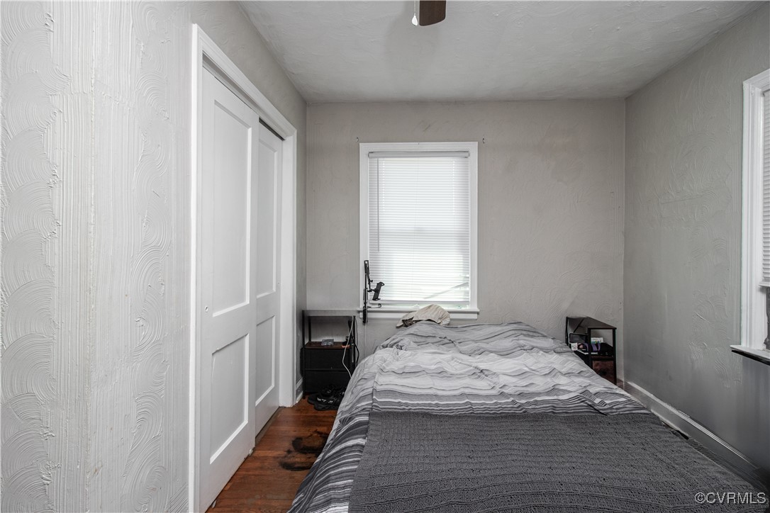 1707 Arlington Road Hopewell, VA 23860 - Photo 8 of 13 a bedroom with a bed and a window