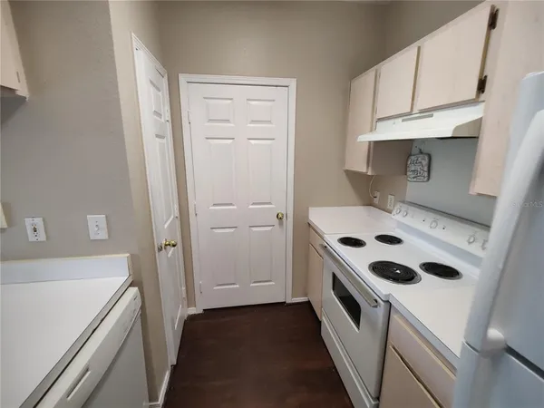 a view of kitchen and sink