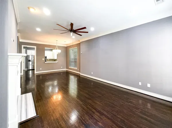 a view of a livingroom with wooden floor
