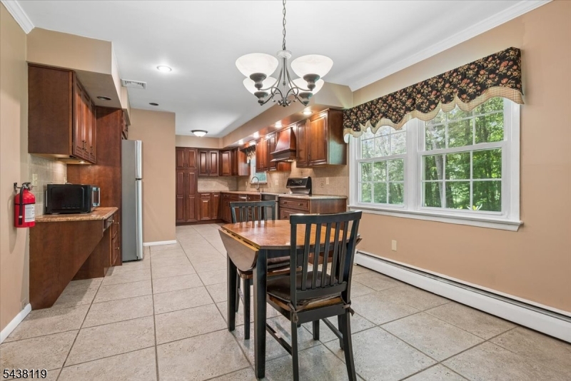 335 Drakestown Road Long Valley, NJ 07853 - Photo 9 of 34 a view of a dining room with furniture window and outside view