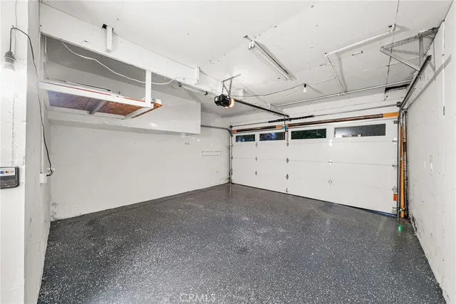 a swimming pool with outdoor seating and yard