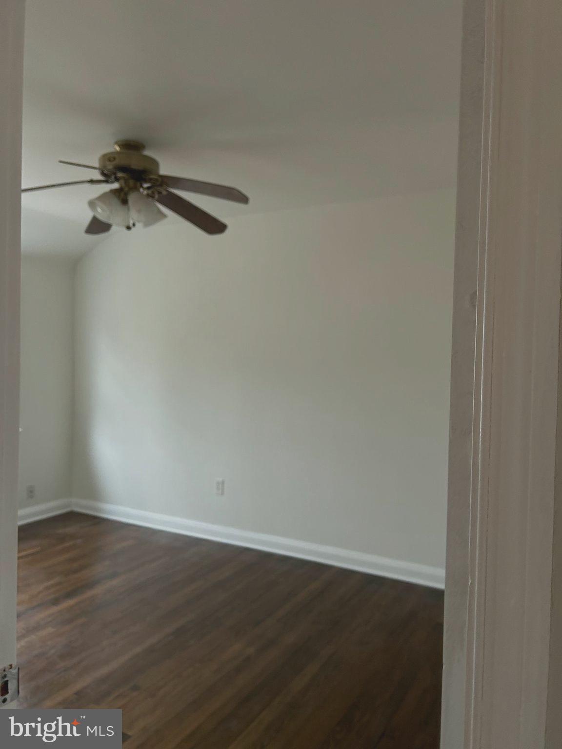 603 Braeside Road Baltimore, MD 21229 - Photo 15 of 30 a view of a room with wooden floor