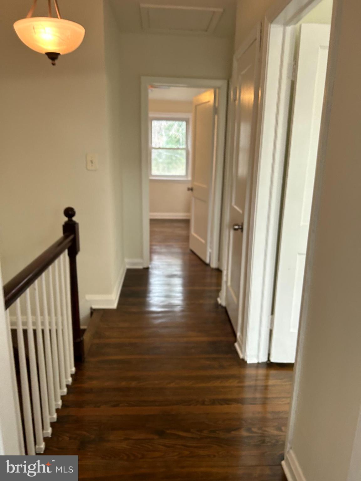 603 Braeside Road Baltimore, MD 21229 - Photo 20 of 30 a view of a hallway view with wooden floor and front door