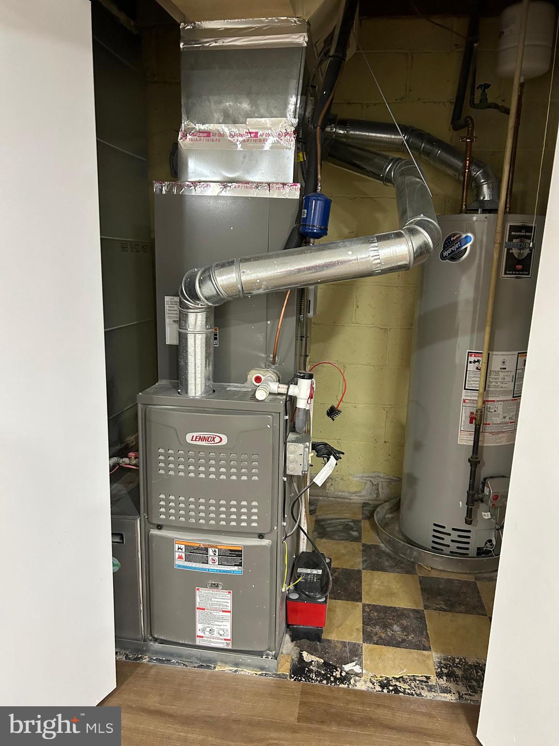 603 Braeside Road Baltimore, MD 21229 - Photo 25 of 30 a room with water heater and storage