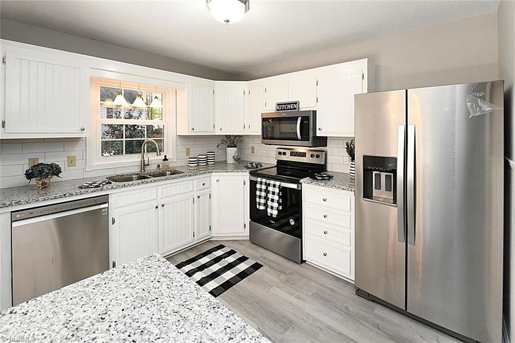 3390 Wide Country Road Pfafftown, NC 27040 - Photo 13 of 50 Completely remodeled kitchen with all new appliances