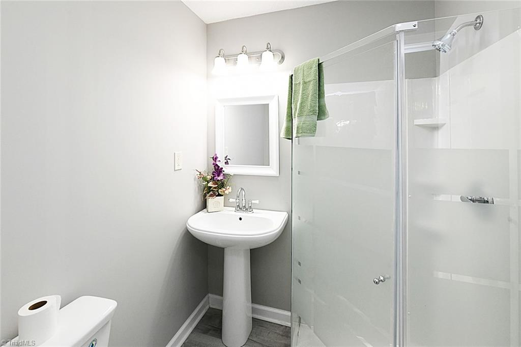 3390 Wide Country Road Pfafftown, NC 27040 - Photo 21 of 50 Primary bedroom has a new walk in shower