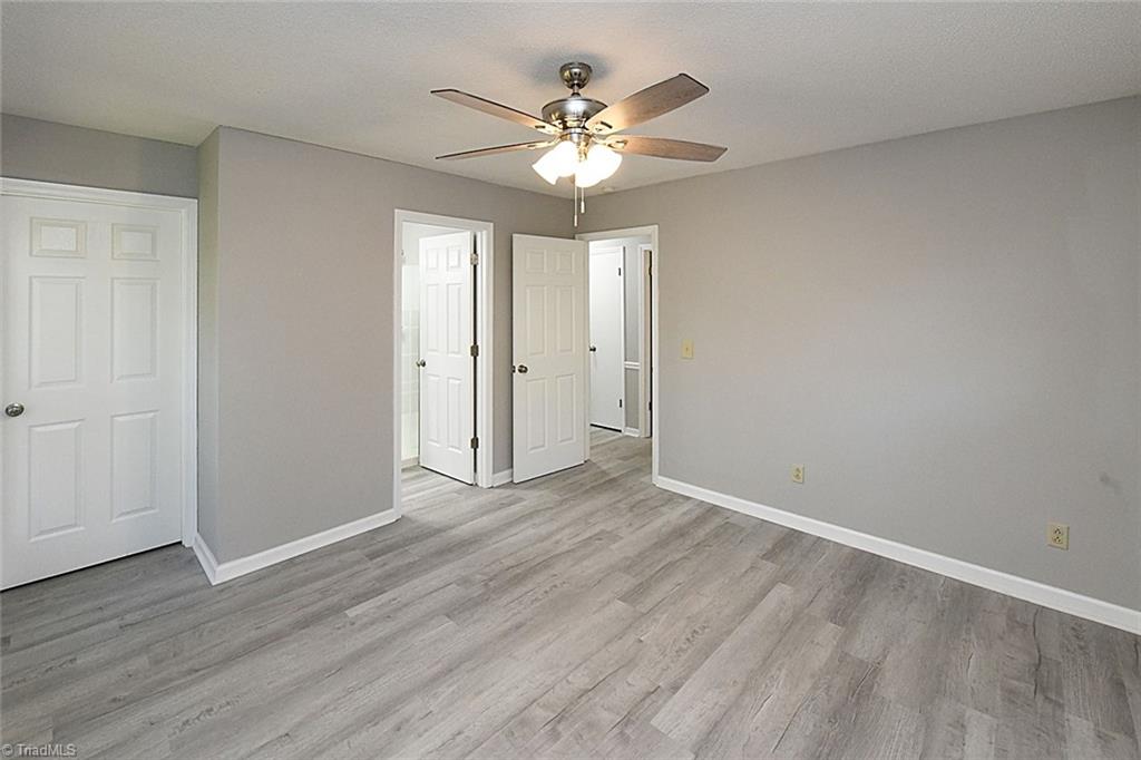 3390 Wide Country Road Pfafftown, NC 27040 - Photo 22 of 50 Closed door leads to walk in closet
