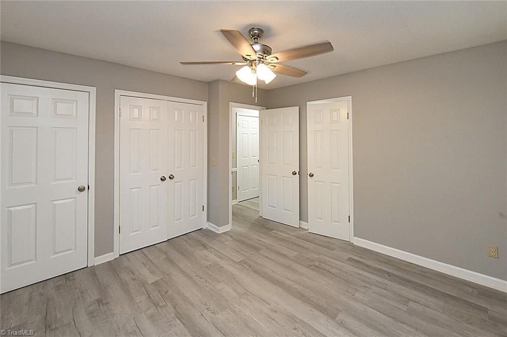 3390 Wide Country Road Pfafftown, NC 27040 - Photo 27 of 50 Bedroom 2 has lots of closet space and a door to the hall bathroom