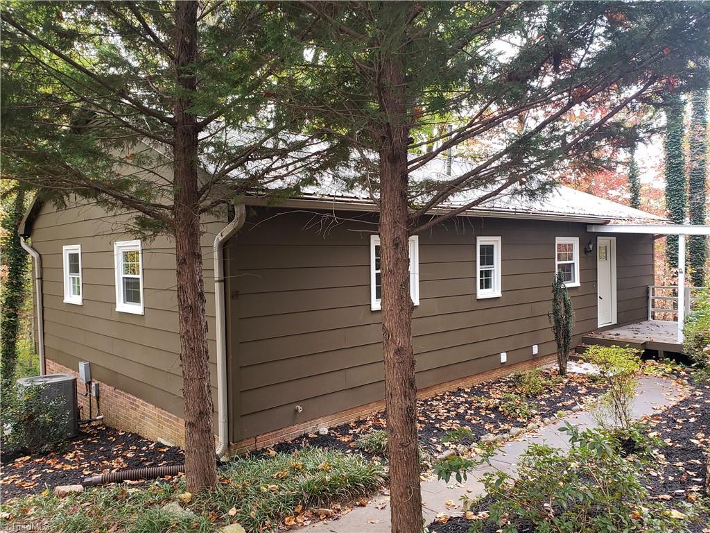 3390 Wide Country Road Pfafftown, NC 27040 - Photo 4 of 50 All new paint inside and out!! Brown metal roof to match!