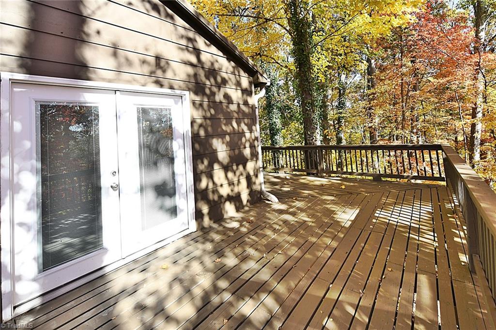 3390 Wide Country Road Pfafftown, NC 27040 - Photo 41 of 50 French doors on the wrap around deck feels like you are in the mountains!!