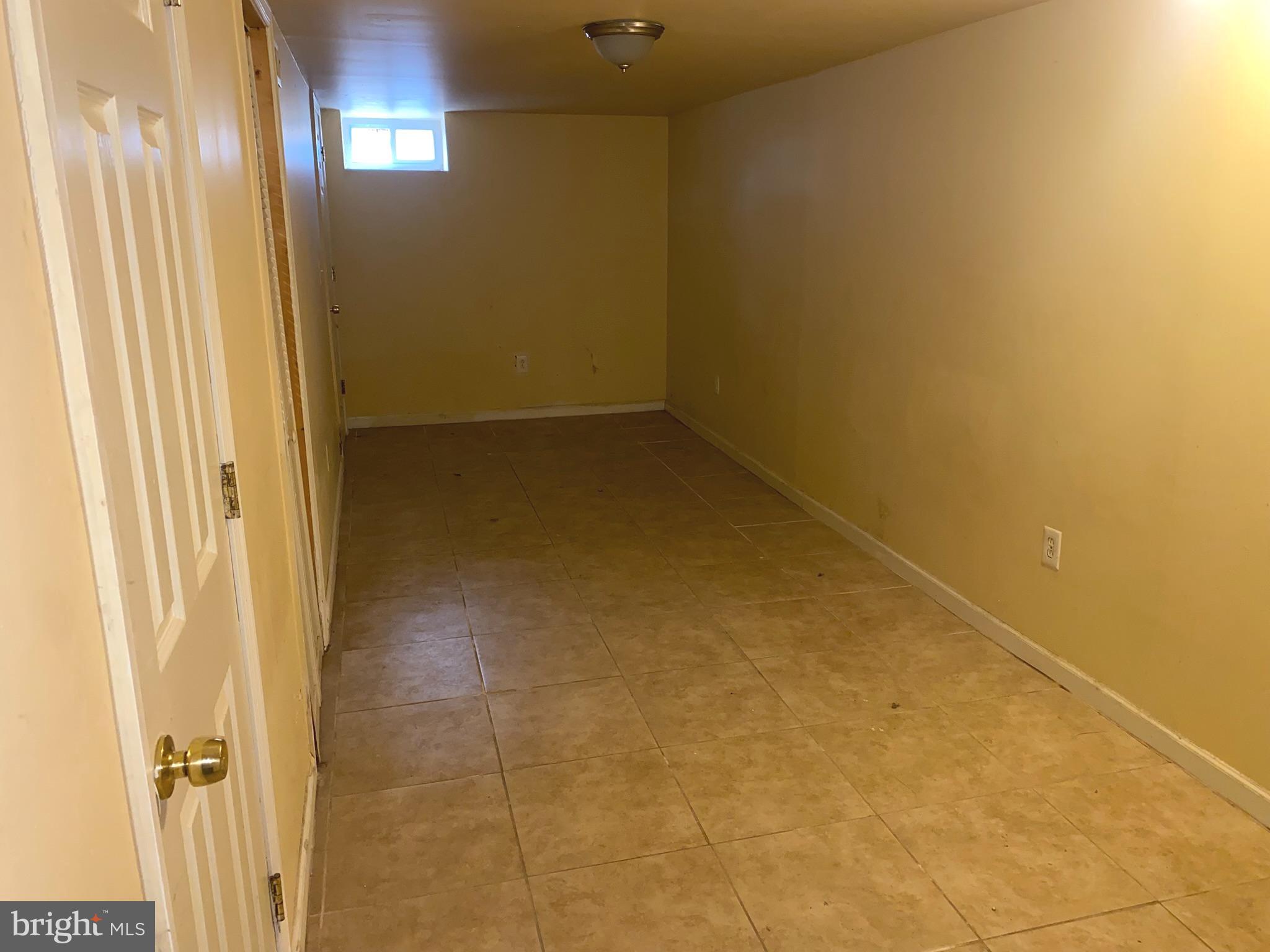 2221 Jefferson Street Baltimore, MD 21205 - Photo 18 of 29 a view of a room with a mirror